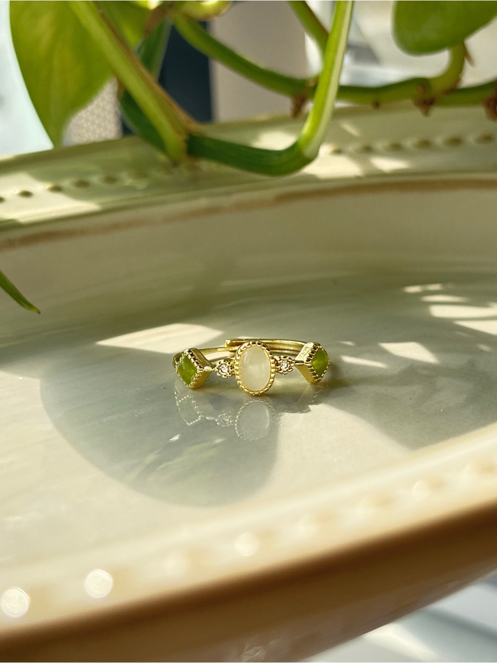 Ring with Cream Center and Green Accents